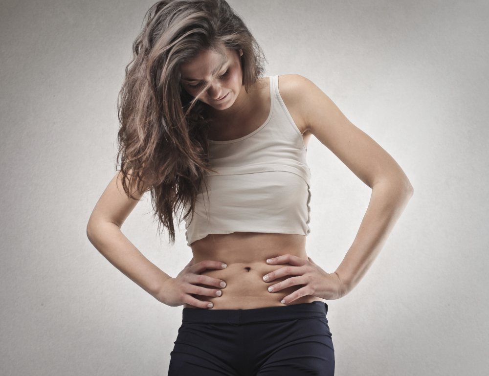 mulher com diástase abdominal